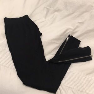 Black tights/leggings with ankle zipper. Size S